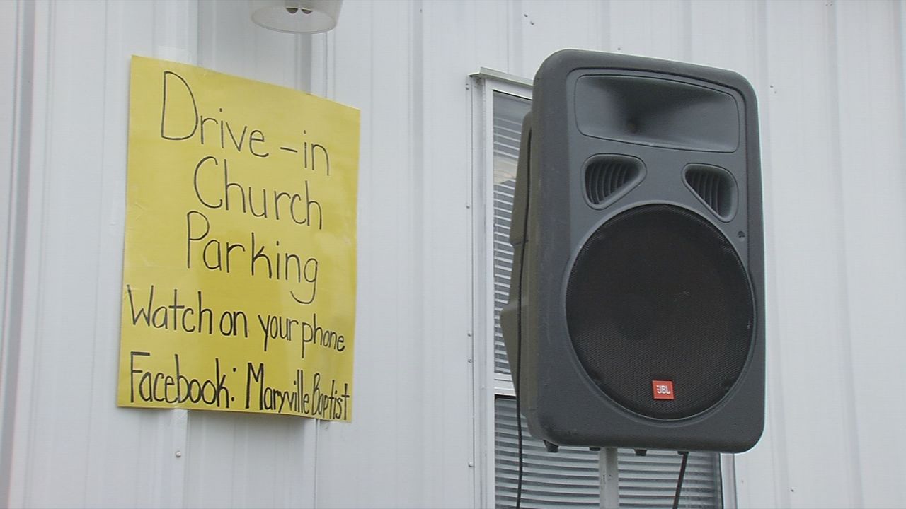 Sign for drive-in church parking at Maryville Baptist Church